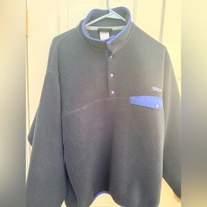 Patagonia navy blue synchilla pullover fleece with blue/purple trim and snap